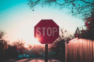 stop sign in sunset